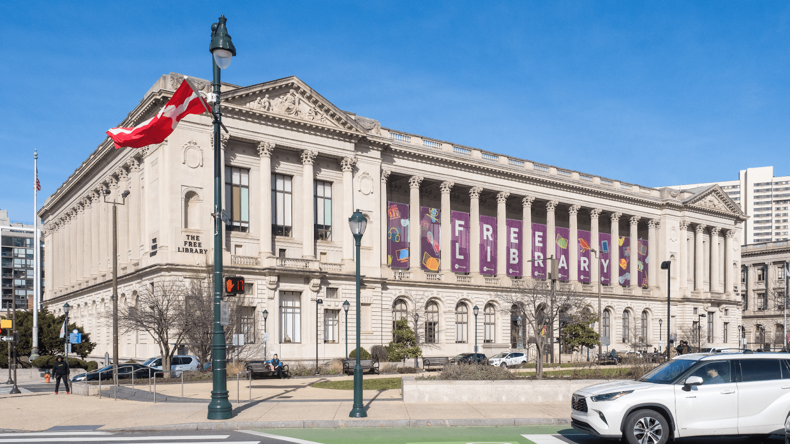 A historical photograph of a grand, columned Carnegie library building in Philadelphia.