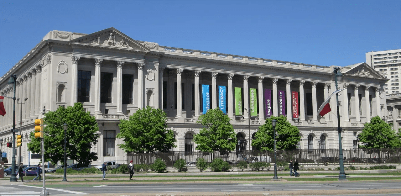 A historical black and white photo of the Parkway Central Library building.
