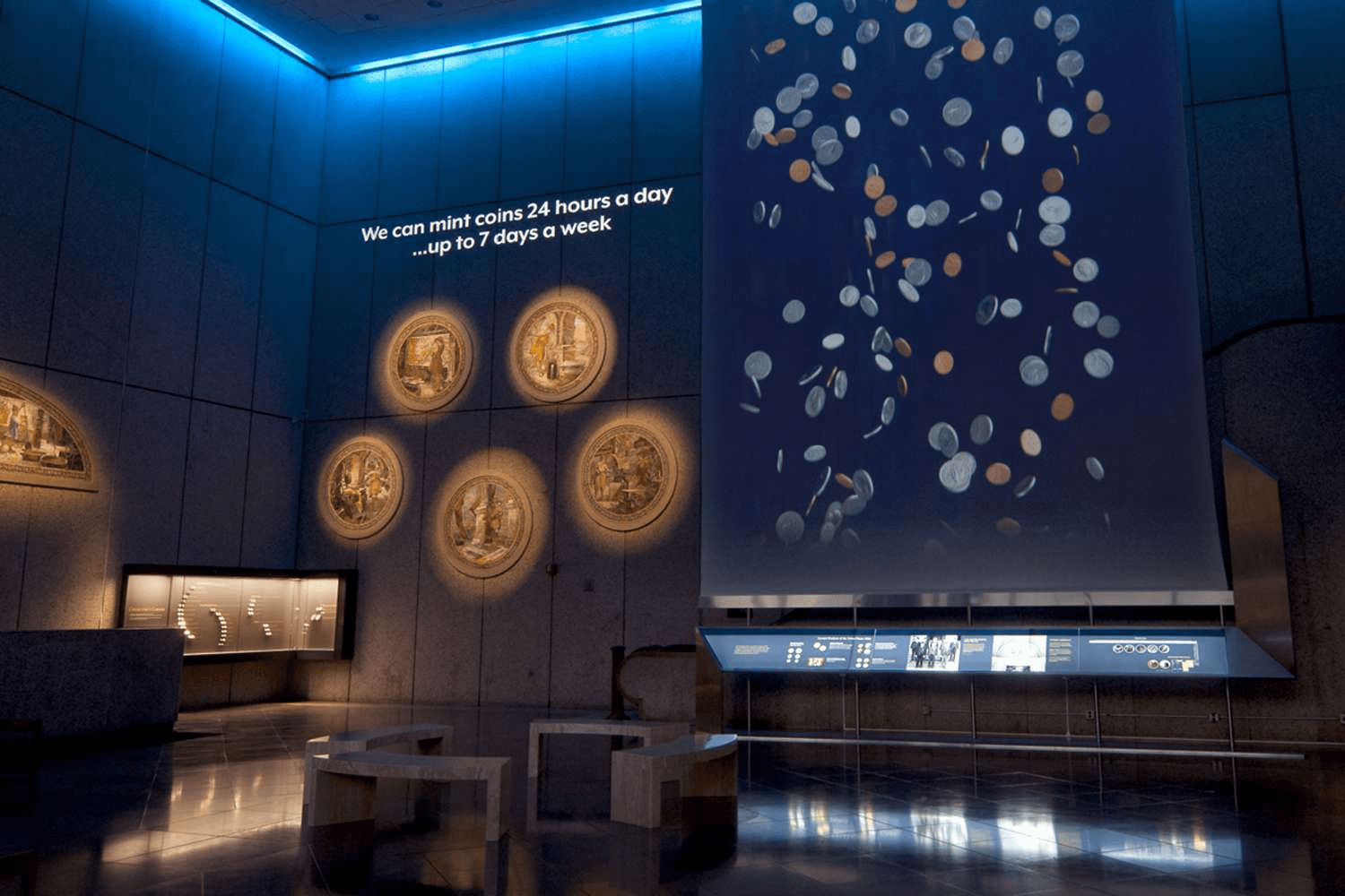 Close-up of a modern coin press in action at the U.S. Mint.
